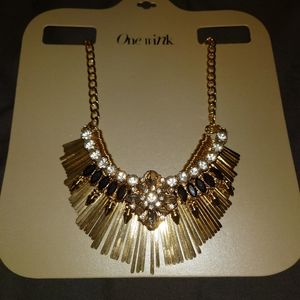 One Wink gold collar necklace